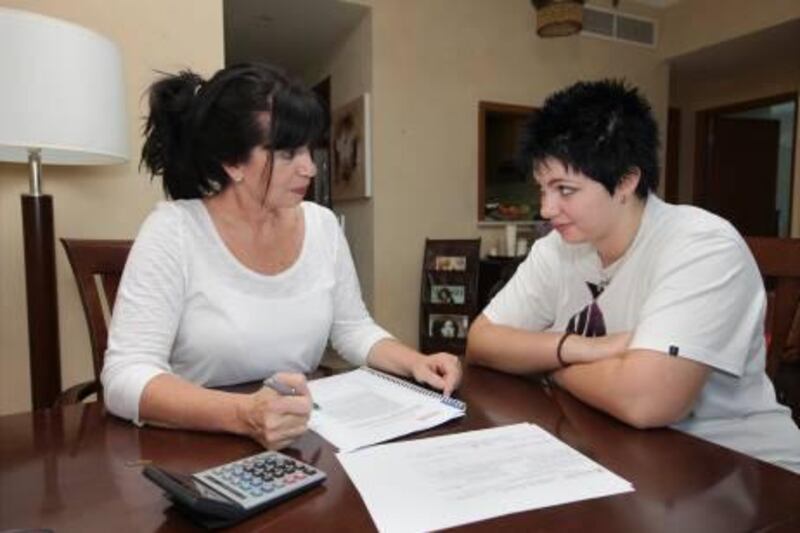 United Arab Emirates - Dubai - Oct 02 - 2010 : Shana Clucus, left, and her 17 year old daughter Kayla at their apartment at Jumeirah Lake Towers. Shana is trying to teach her financial responsibility before she heads off to college. ( Jaime Puebla / The National )