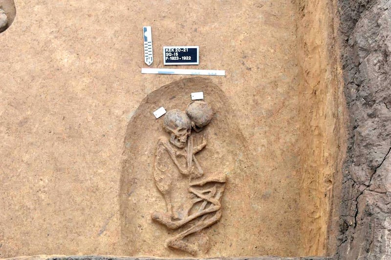 This photo provided by the Egyptian Tourism and Antiquities Ministry on Tuesday, April 27, 2021, shows an ancient burial tomb unearthed recently with human remains, in the Koum el-Khulgan archeological site, in the Nile Delta province of Dakahlia, around 150 kilometers (93 miles) northeast of Cairo, Egypt. Archeologists unearthed 110 burial tombs in the ancient site in a Nile Delta province, the Tourism and Antiquities Ministry said on Tuesday. (Egyptian Tourism and Antiquities Ministry via AP)