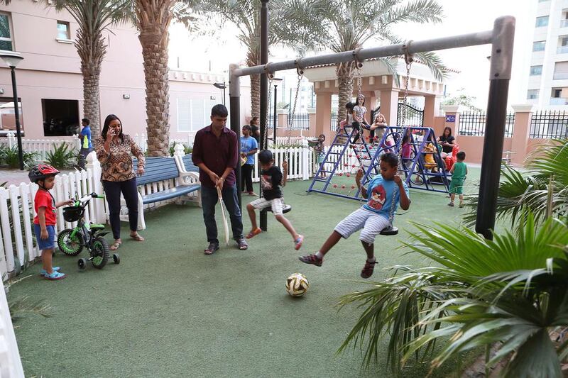 Children playing in the outdoor area at the Silicon Star 1 building in Silicon Oasis in Dubai. Home safety inspections are designed to give residents peace of mind. Pawan Singh / The National