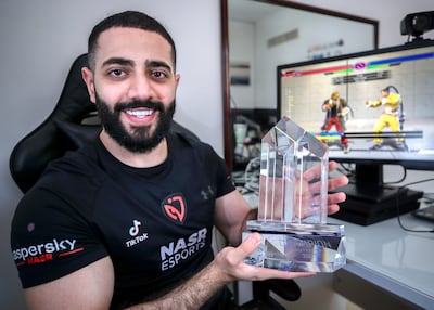 Abu Dhabi resident Amjad 'AngryBird' Al Shalabi represented Nasr Esports at Evo in August, taking home the top prize. Victor Besa / The National