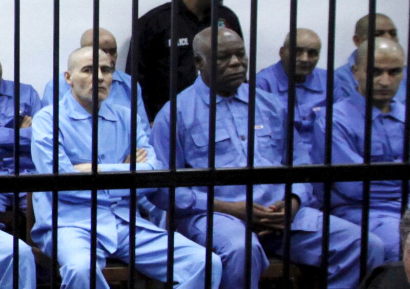 Abu Agila Mohammad Masud, second from left, a Libyan man accused of making the bomb that destroyed Pan Am Flight 103, has been taken into US custody. He was charged by the US two years ago in connection with the Lockerbie bombing. Reuters
