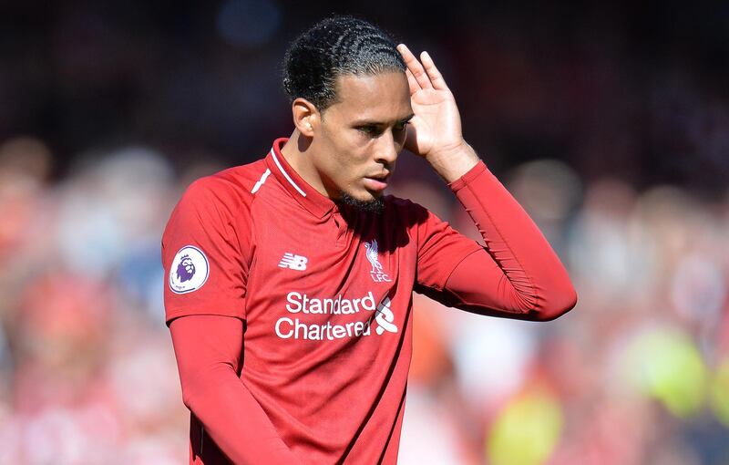 epa07564898 Liverpool's Virgil Van Dijk reacts after winning the English Premier League match between Liverpool FC and Wolverhampton Wanderers FC at Anfield, Liverpool, Britain, 12 May 2019.  EPA/PETER POWELL EDITORIAL USE ONLY.  No use with unauthorized audio, video, data, fixture lists, club/league logos or 'live' services. Online in-match use limited to 120 images, no video emulation. No use in betting, games or single club/league/player publications.
