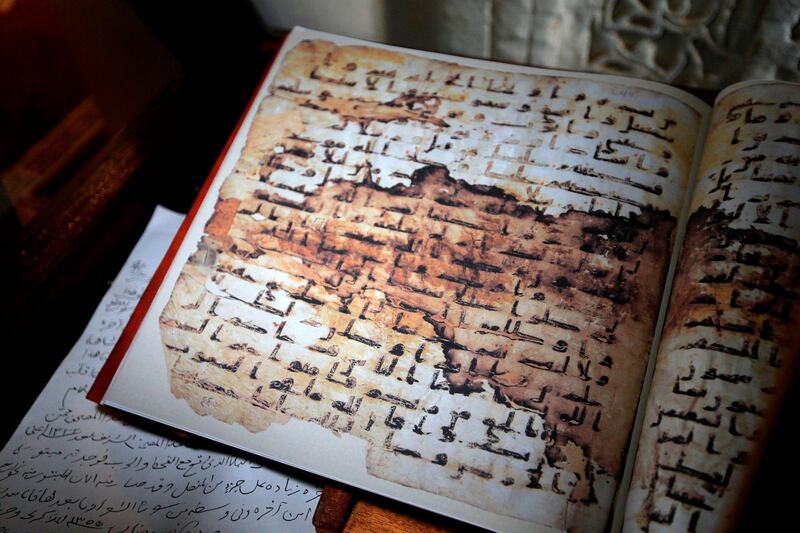 This picture taken on December 15, 2020 shows a view of a rare manuscript of the Holy Koran, Islam's holiest book, kept at the Grand Mosque of Yemen's capital Sanaa.  / AFP / Mohammed HUWAIS
