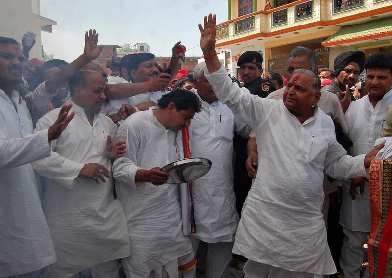Yadav waves to his supporters before filing his nomination for the general election in Mainpuri, Uttar Pradesh, in April 2014. Reuters