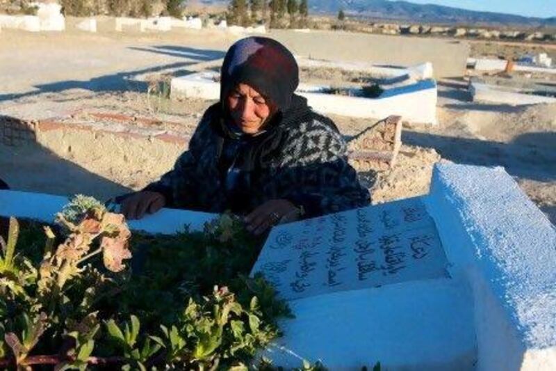 Rebah Briki visits her son’s grave in Kasserine, Tunisia. He was killed by security forces during the uprising that toppled Zine El Abidine Ben Ali and that sparked a wave of protests across the Arab world.