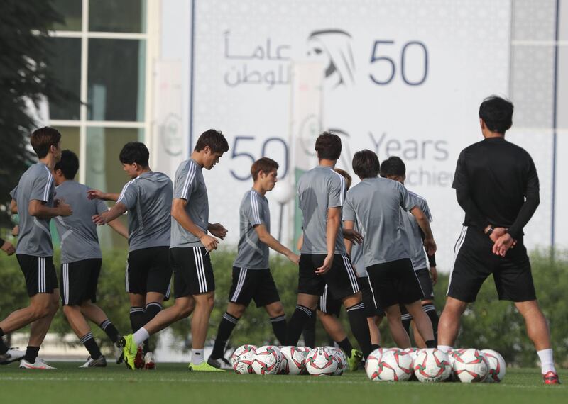 Japan take part in a training session in Abu Dhabi on the eve of their Asian Cup quarter-final match against Vietnam. All photos by Karim Sahib / AFP