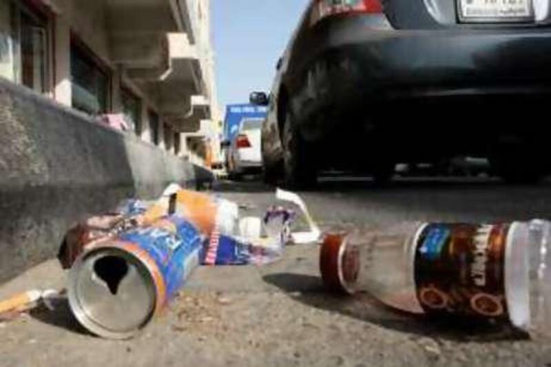 
DUBAI, UNITED ARAB EMIRATES Ð Oct 20: Rubbish can be seen on the roadside in Karama area of Dubai. (Pawan Singh / The National) Story by Praveen
 *** Local Caption ***  PS02- RUBBISH.jpg
