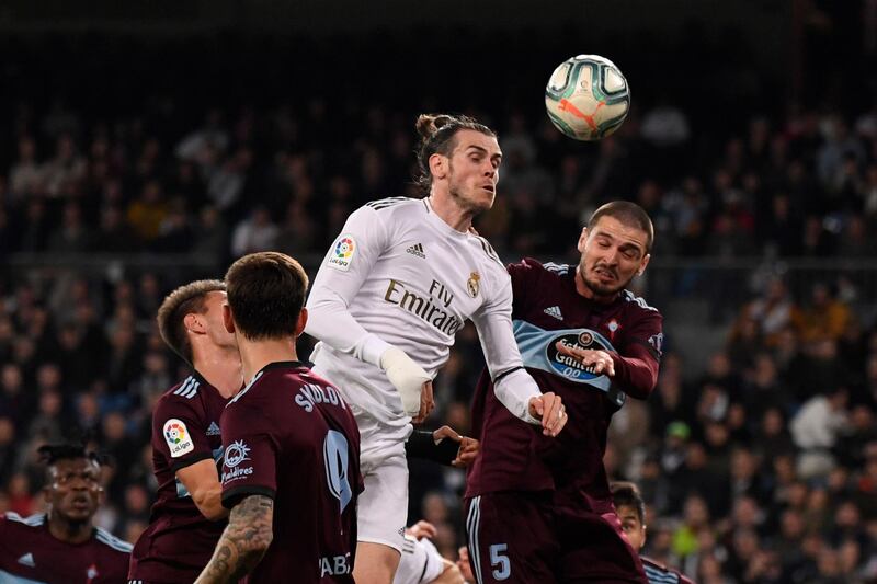 Real Madrid forward Gareth Bale heads the ball. AFP