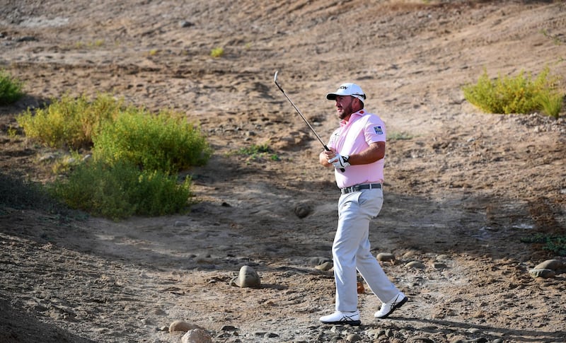 KING ABDULLAH ECONOMIC CITY, SAUDI ARABIA - FEBRUARY 01:  Graeme McDowell of Northern Ireland on the 18th hole during the third round of the Saudi International at Royal Greens Golf and Country Club on February 01, 2020 in King Abdullah Economic City, Saudi Arabia. (Photo by Ross Kinnaird/Getty Images)