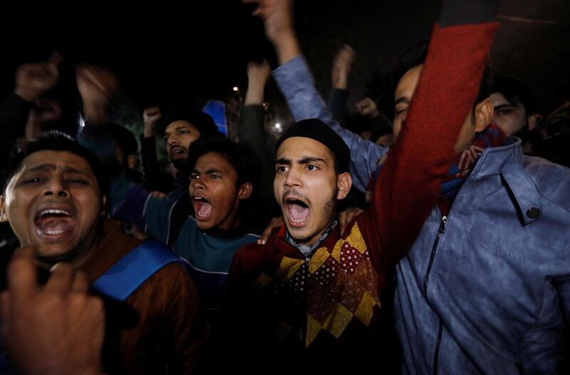 Demonstrators shout slogans during a protest against a new citizenship law, outside the police headquarters in New Delhi, India, December 16, 2019. REUTERS/Adnan Abidi