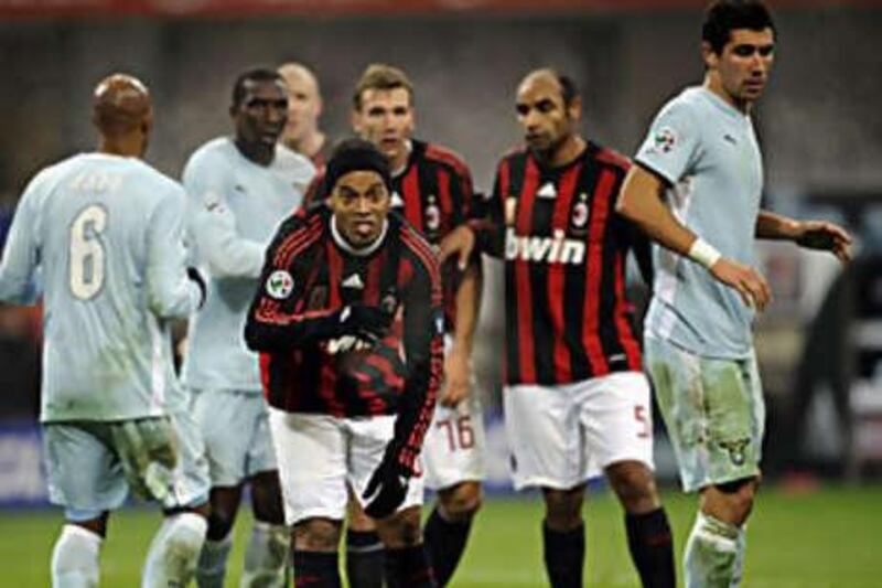 AC's Ronaldinho, centre, shows his frustration during the 2-1 midweek Coppa Italia defeat to Lazio.