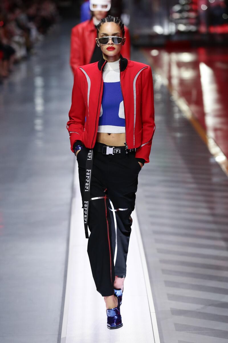 A model walks the runway at the fashion debut of the first co-ed Ferrari collection at Ferrari Factory on June 13, 2021 in Maranello, Italy. Getty Images