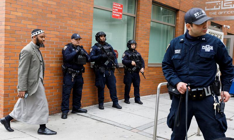 epa07440470 New York City police officers, including officers from the department's Counterterrorism Unit, provide security at the Islamic Cultural Center of New York as people arrive for Friday prayers in New York, New York, USA, 15 March 2019. Security in New York, and at sites around the world, was heightened following what was described as terrorist attacks at two mosques in New Zealand where 49 people were killed by a gunman and 20 more injured and in critical conditions.  EPA/JUSTIN LANE