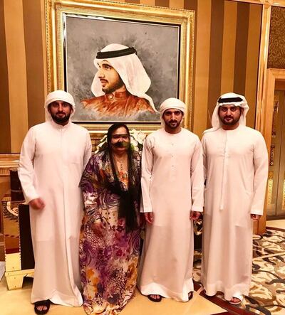 Mama Noora pictured with Sheikh Hamdan bin Mohammed, Crown Prince of Dubai, Sheikh Maktoum bin Mohammed, Deputy Ruler of Dubai, (R) and Sheikh Ahmed bin Mohammed, chairman of the Mohammed bin Rashid Al Maktoum Knowledge Foundation (L). Courtesy Mama Noora Instagram