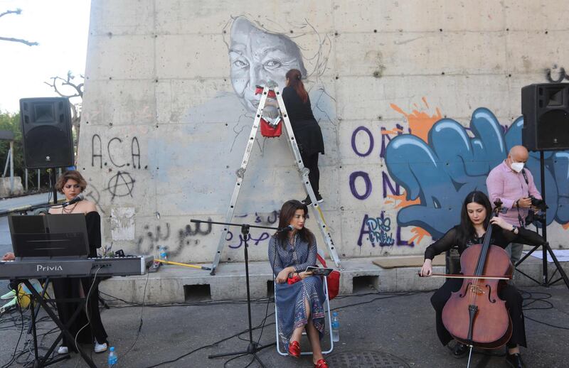 Musicians and poets perform in El Saadawi's memory. AFP
