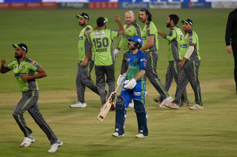 Multan Sultans batsman Adam Lyth walks back after being dismissed by David Wiese. AP