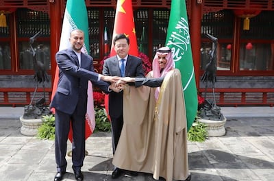 Iranian Foreign Minister Hossein Amir-Abdoulahian (left), Chinese Foreign Minister Qin Gang (centre) and Saudi Foreign Minister Prince Faisal bin Farhan Al Saud in Beijing, China. EPA