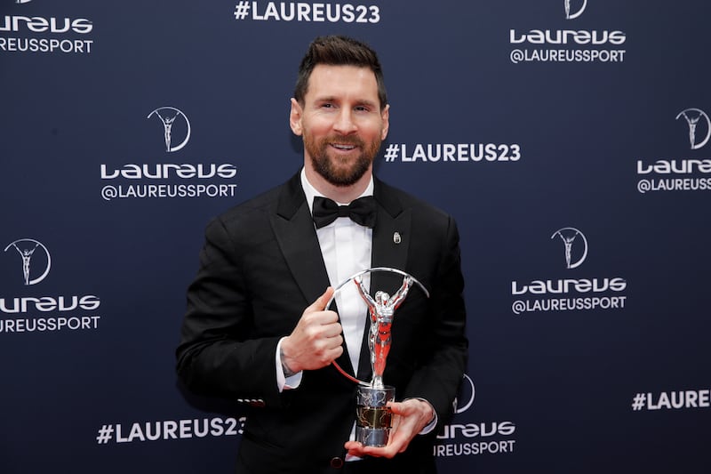 Argentinian soccer player Lionel Messi poses with Laureus World Sportsman of the Year Award in Paris on May 8. EPA
