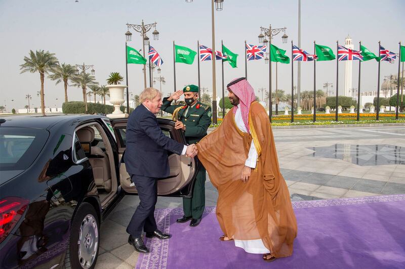 Mr Johnson arrives for a meeting with Prince Mohammed.