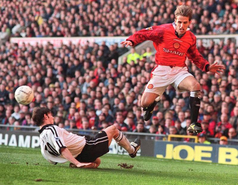 Manchester United v Derby County, Premiership, 21/2/98 
Pic: Nick Potts/Action  Images 
United's Phil Neville evades the tackle of Rory Delap