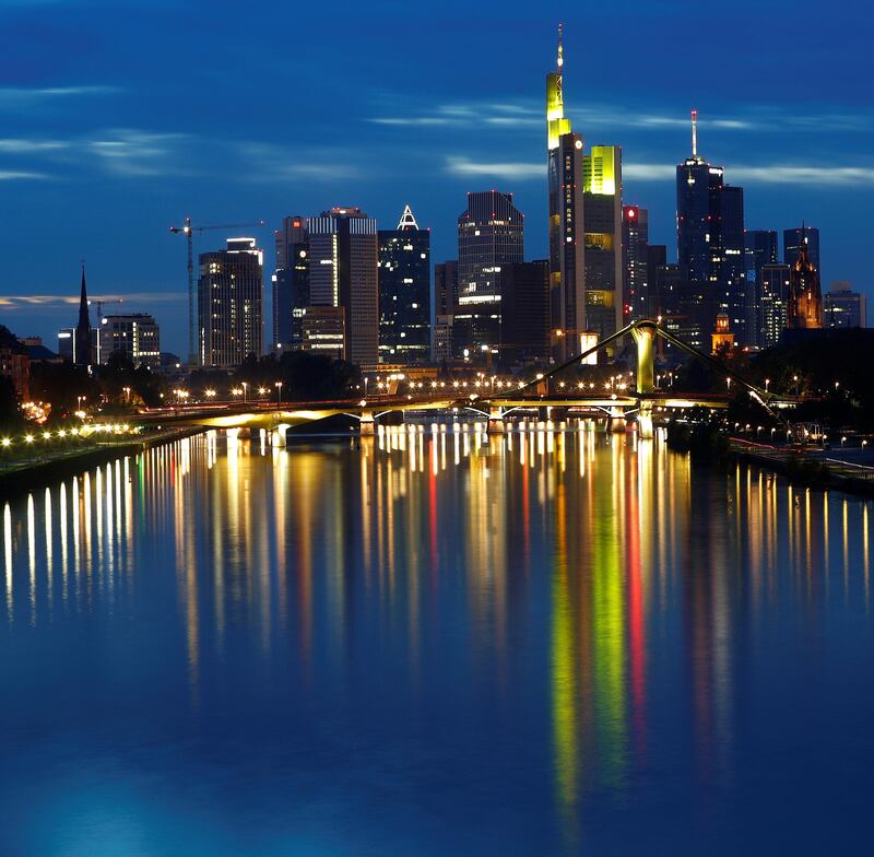 The skyline, with its characteristic banking towers, is reflected in river Main in Frankfurt, Germany, October 1, 2017. REUTERS/Kai Pfaffenbach