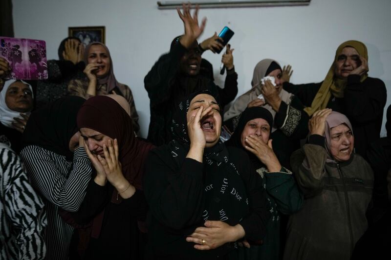 Mourning for Samer El Shafei, one of two Palestinian men killed during a raid by Israeli forces in the Nur Shams refugee camp in the occupied West Bank, on May 6, 2023.  AP