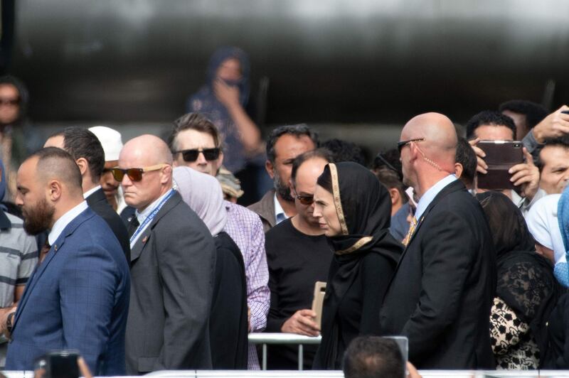 New Zealand Prime Minister Jacinda Ardern (C) attends a gathering for congregational Friday prayers and to observe two minutes of silence for victims of the twin mosque massacre, at Hagley Park in Christchurch on March 22, 2109. AFP