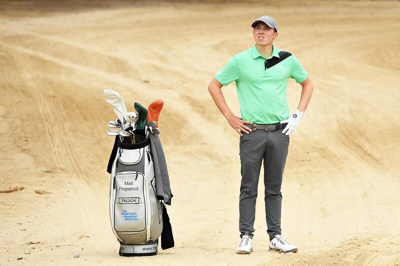 Matthew Fitzpatrick of England looks on from a bunker on the 12th hole. Getty Images