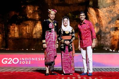 UK Prime Minister Rishi Sunak is welcomed by Indonesian President Joko Widodo and his wife Iriana at the G20 Summit in Bali. AFP