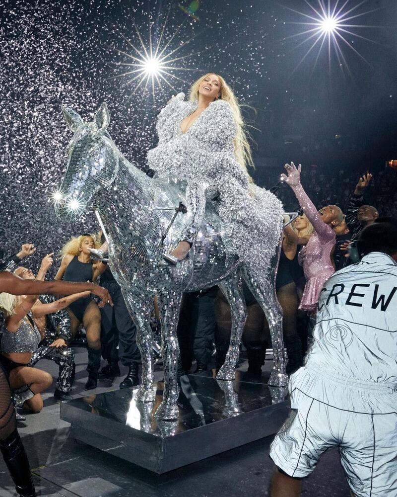 Sitting on a metallic horse, Beyonce wears a silver coat by Balmain and a catsuit by LaQuan. All photos: @beyonce / Instagram