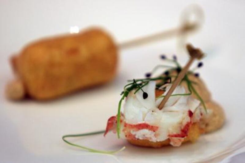Vincent Pouessel’s Maine lobster corn dog with tarragon espuma.