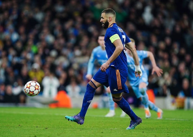 Real Madrid's Karim Benzema scores their third goal with a penalty. PA