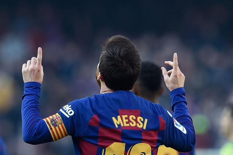 Barcelona's Argentine forward Lionel Messi celebrates after scoring his second goal. AFP