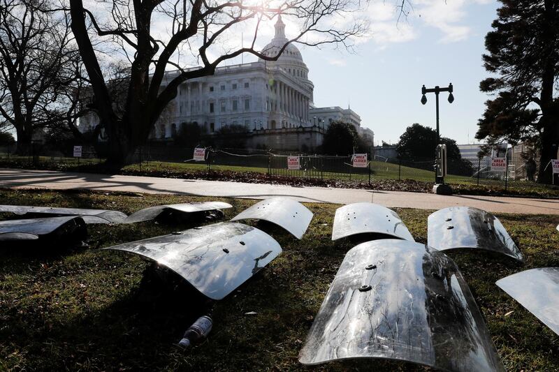 U.S. National Guard riot shields are laid out at the ready outside the U.S. Capitol Building on Capitol Hill in Washington.  REUTERS