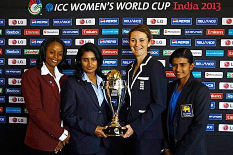 Team captains – from left, West Indies’ Merissa Aguilleira, India’s Mithali Raj, England captain Charlotte Edwards and Sri Lanka’s Shashikala Siriwardena – with the ICC Women's World Cup trophy. Rafiq Maqbool / AP Photo