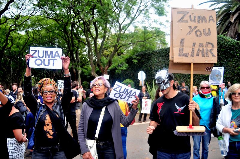 JOHANNESBURG, SOUTH AFRICA  APRIL 07: (SOUTH AFRICA OUT): Protestors outside the Gupta's Saxonwold residence call for President Zuma to step down on 07 April 2017 in Johannesburg, South Africa. Protesters gathered outside the Guptas compound whom, through their businesses, are accused of links to government officials and the president. (Photo by Dino Lloyd/Gallo Images/Getty Images)