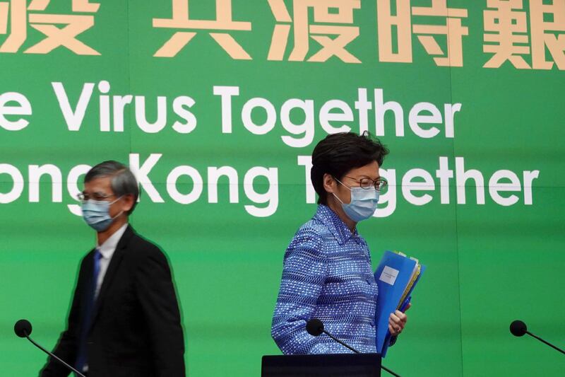 Hong Kong Chief Executive Carrie Lam wearing a face mask arrives for a news conference on the novel coronavirus disease (COVID-19) outbreak, in Hong Kong, China April 8, 2020.  REUTERS/Joyce Zhou