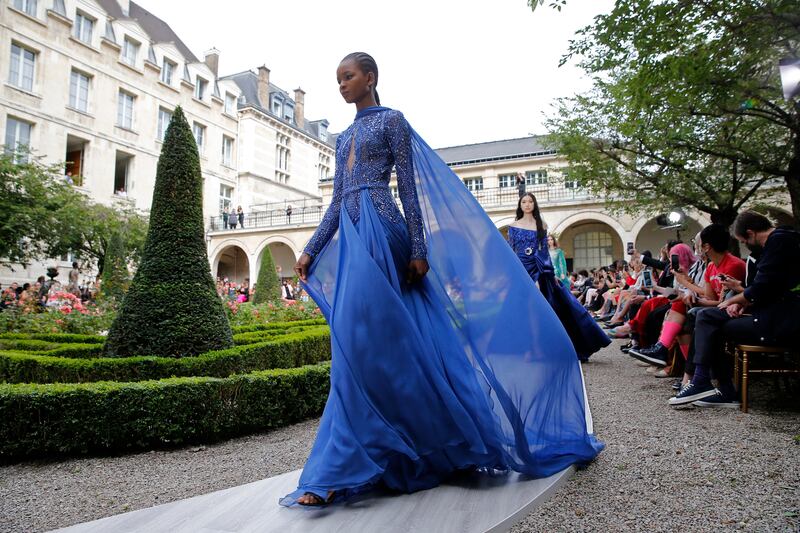 Zuhair Murad delivers unabashed opulence while returning to the runway after the fashion world's hiatus during the pandemic. Getty