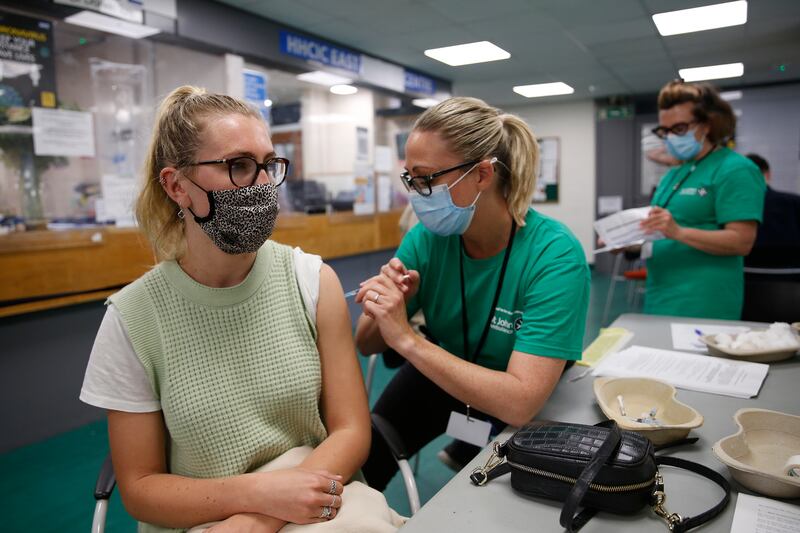 People in England who are close contacts of a positive Covid-19 case will no longer have to isolate if they are fully vaccinated. Getty