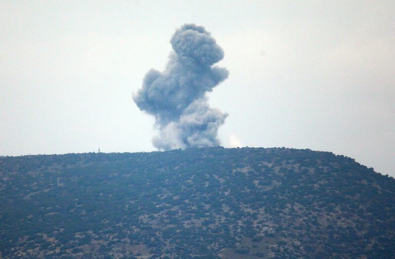 A plume of smoke from an air bombardment rises from an impact inside Syria as seen from the Hatay province, Turkey, near the border Wednesday, Jan. 24, 2018. Turkey's President Recep Tayyip Erdogan said Wednesday its military offensive into a Kurdish-held enclave in northern Syria is progressing "successfully" and will continue until the last "terrorist is eliminated". (AP Photo/Lefteris Pitarakis)