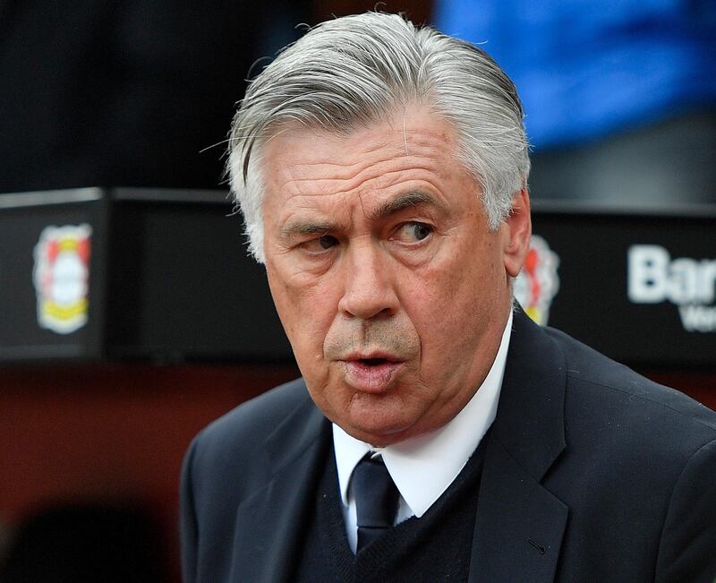 FILE - In this April 15, 2017 fiel photo Bayern head coach Carlo Ancelotti arrives to the German Bundesliga soccer match between Bayer Leverkusen and Bayern Munich in Leverkusen, Germany. (AP Photo/Martin Meissner, file)