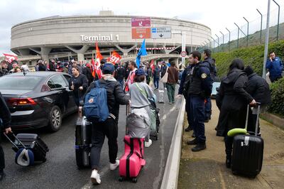 Striking workers blockaded a road to Terminal 1 of Charles de Gaulle Airport. Reuters 