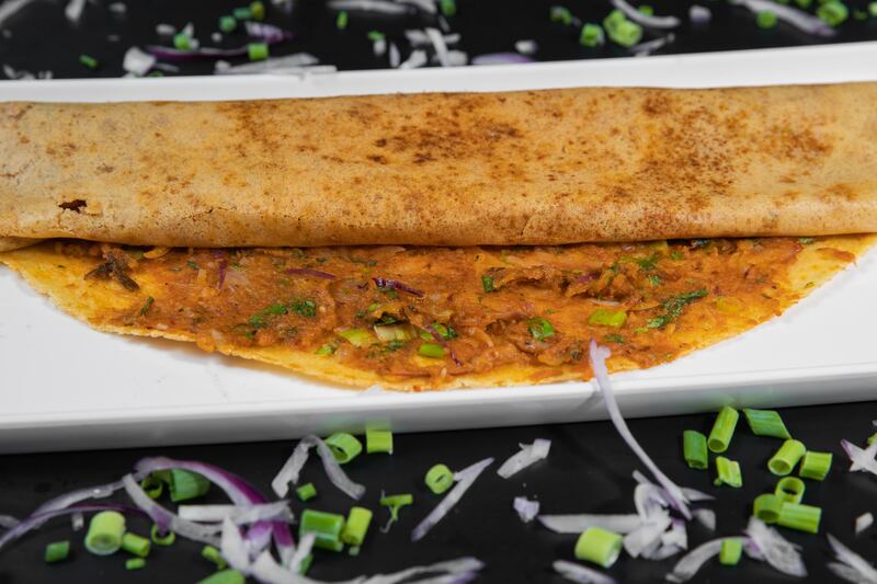 Indian dosas can be plain or stuffed with a host of ingredients, from cheese and potatoes to Indo-Chinese fillings. Photo: Yummy Dosa