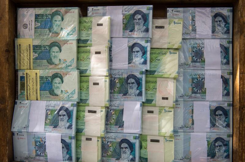 Iranian rial banknotes stand on display at a currency exchange in Tehran, Iran, on Saturday, Nov. 3, 2018. Iran’s Supreme Leader Ayatollah Khamenei said U.S. President Donald Trump’s policies are opposed by most governments and fresh sanctions on the Islamic Republic only serve to make it more productive and self-sufficient, the semi-official Iranian Students’ News Agency reported. Photographer: Ali Mohammadi/Bloomberg