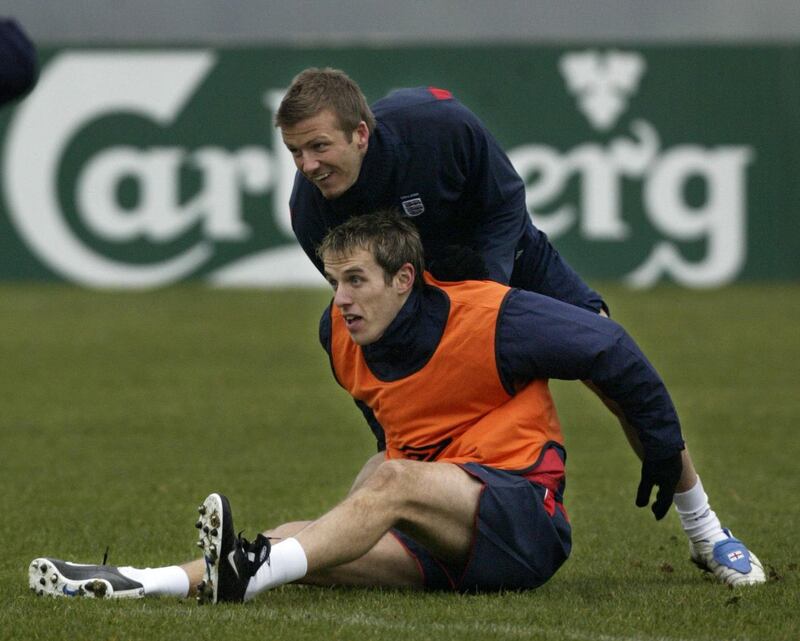 England's David Beckham with Phil Neville in 2005. PA