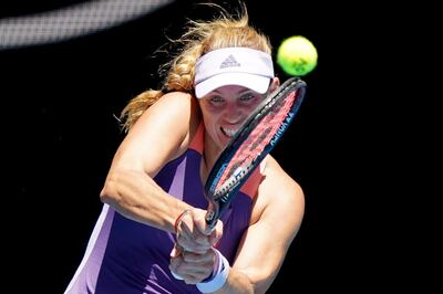 epa08161331 Angelique Kerber of Germany in action against Camila Giorgi of Italy during their third round match at the Australian Open tennis tournament at Melbourne Park in Melbourne, Australia, 25 January 2020.  EPA/SCOTT BARBOUR AUSTRALIA AND NEW ZEALAND OUT  EDITORIAL USE ONLY