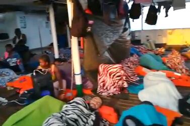 Migrants on board the Open Arms ship in Lampedusa island. EPA