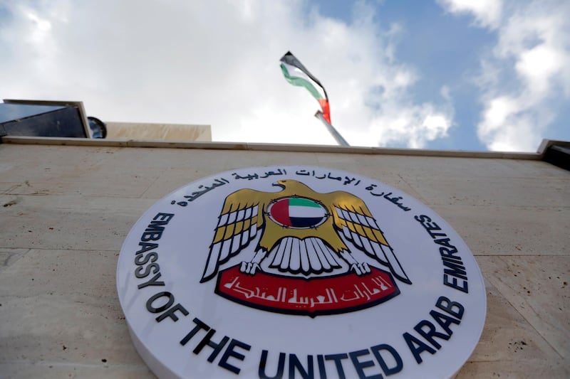 The flag of the UAE flutters atop the embassy building during the inauguration ceremony of the reopening of the embassy in Damascus, Syria. EPA