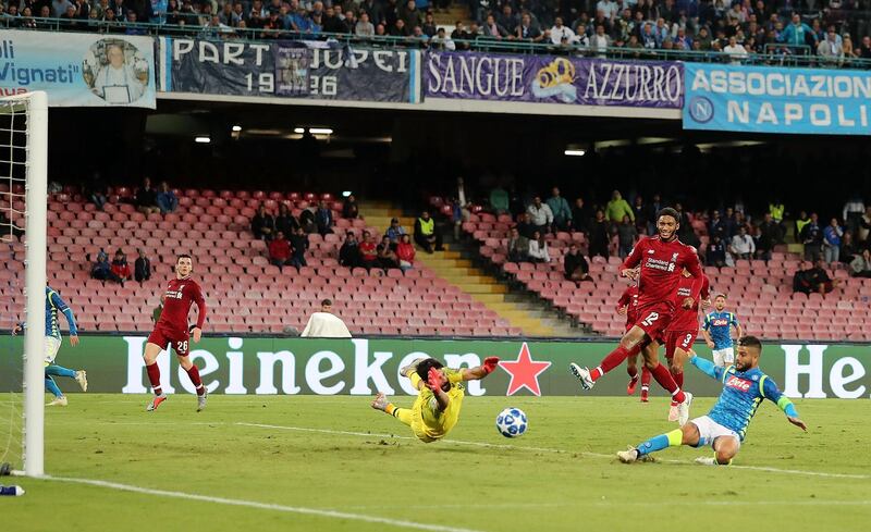 NAPLES, ITALY - OCTOBER 03: Lorenzo Insigne of SSC Napoli scores the 1-0 goal during the Group C match of the UEFA Champions League between SSC Napoli and Liverpool at Stadio San Paolo on October 3, 2018 in Naples, Italy.  (Photo by Francesco Pecoraro/Getty Images)