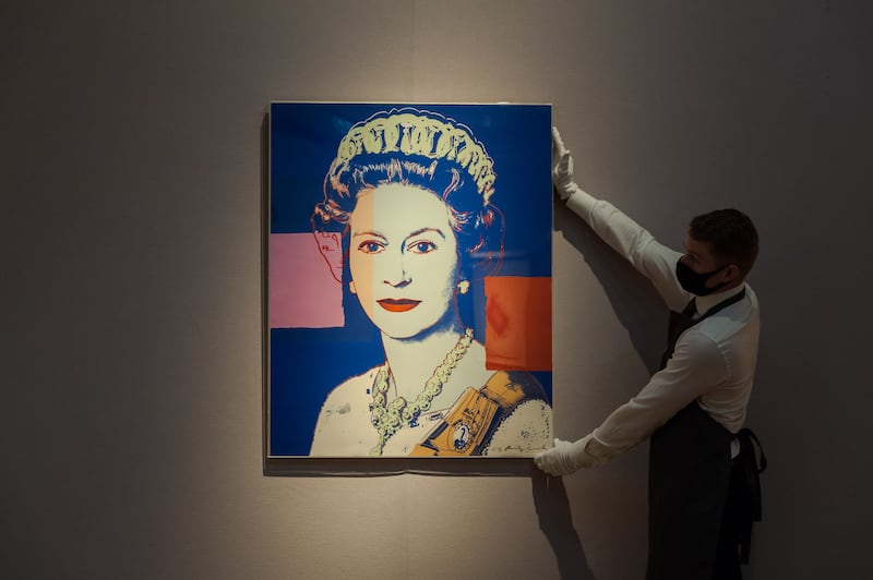 The Royal Edition of Andy Warhol's Queen Elizabeth II, which is decorated with diamond dust, was sold for $853,000 in Toronto. Photo: Future Publishing via Getty Images